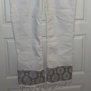 White jeans with pattern and tassel bottom!